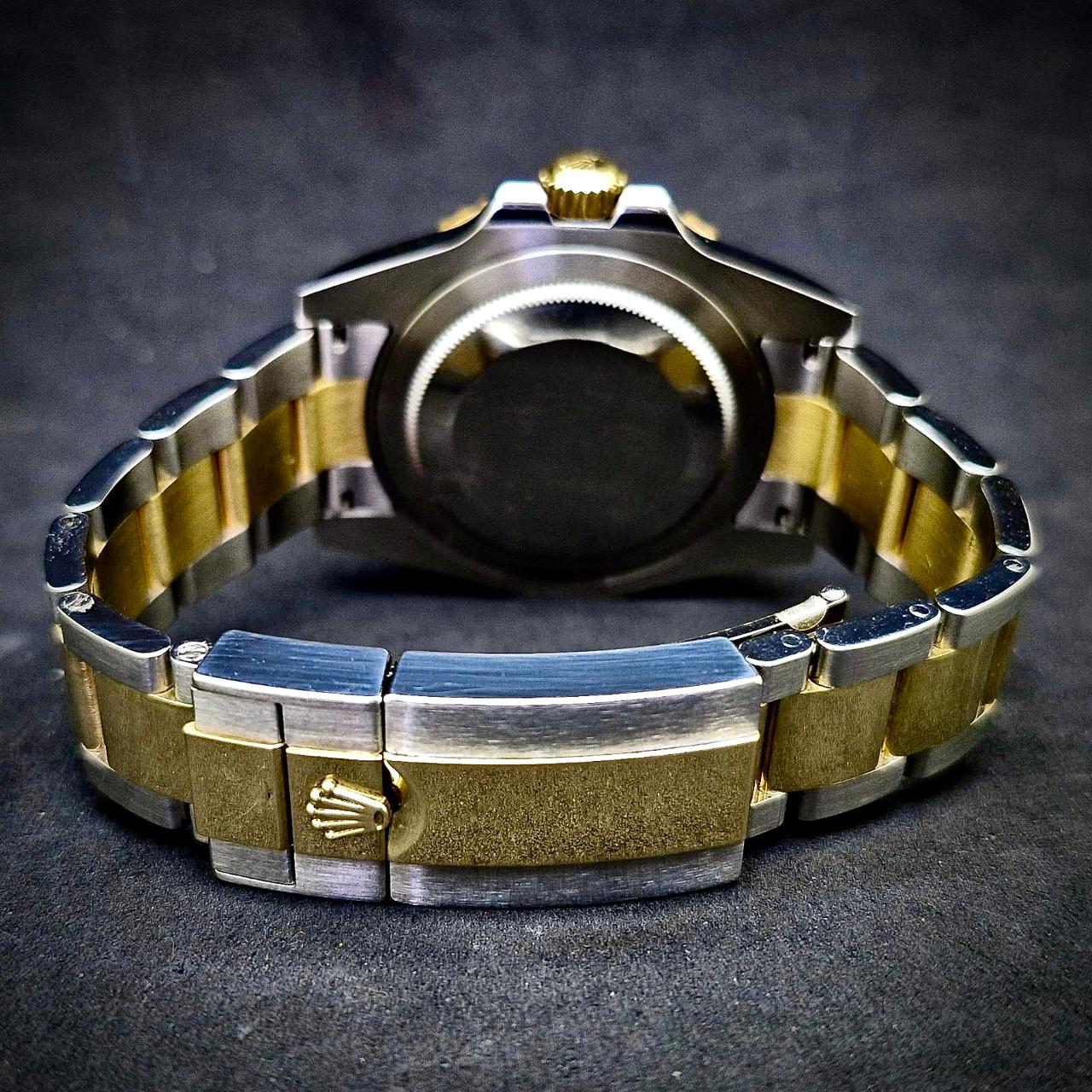 ROLEX GMT MASTER II - GOLD & STEEL